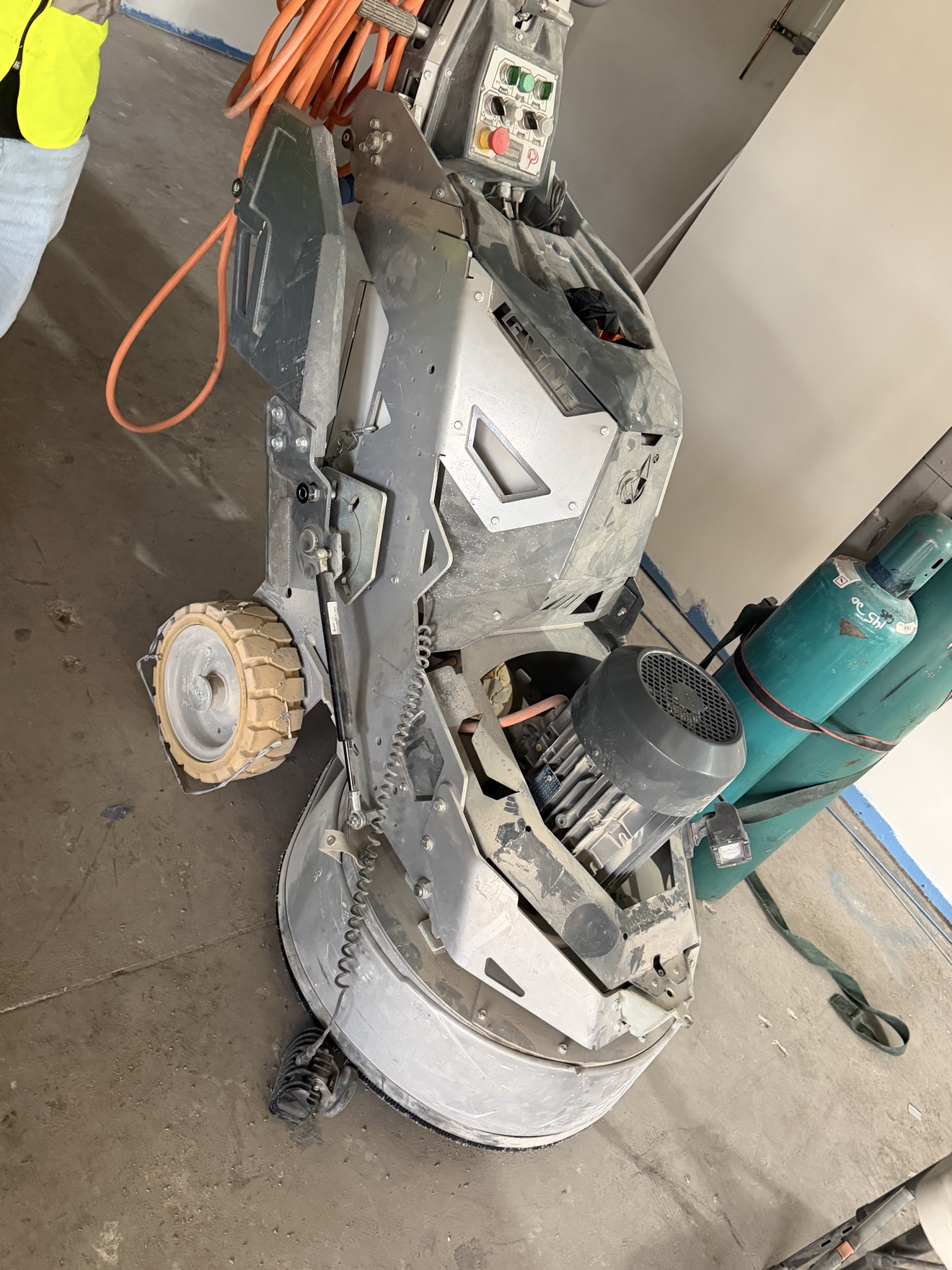 Commercial concrete grinding equipment used for floor preparation