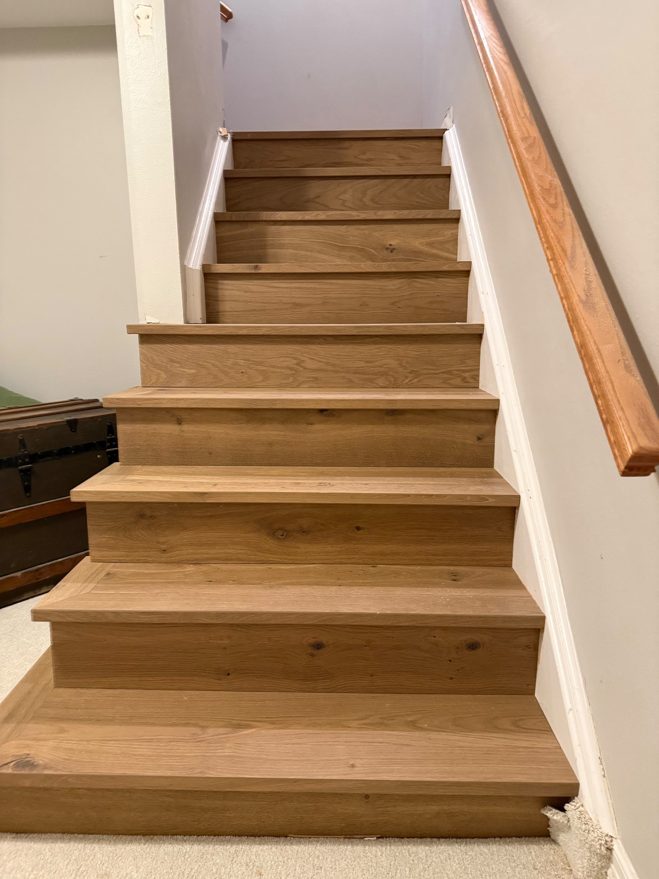 Custom natural oak staircase in a residential interior